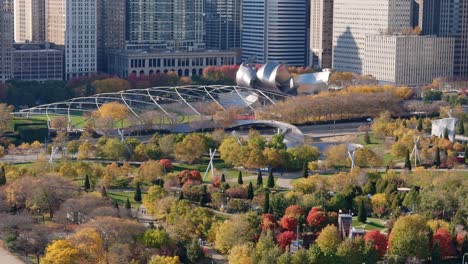 Maggie-Daley-Park-downtown-Chicago-Illinois,-colorful-fall-foliage,-Aerial-drone-establishing-shot-4k