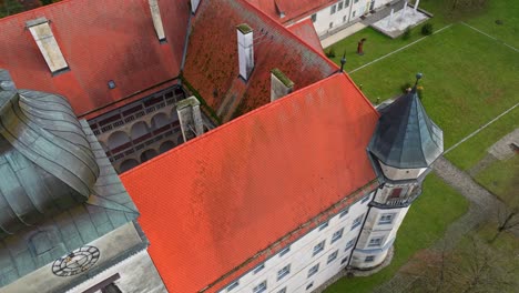 Exterior-Of-Hartheim-Castle-In-Alkoven,-Upper-Austria---Aerial-Drone-Shot