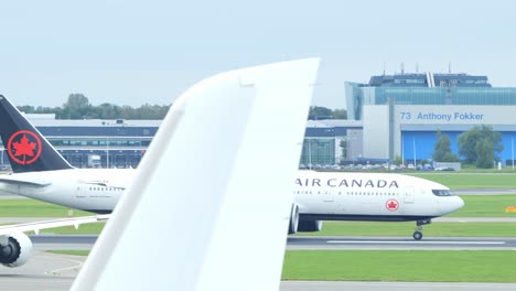 Air-Canada-flight-on-the-tarmac,-engines-humming-softly-waiting-to-depart
