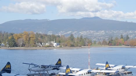 Harbour-Air-Seaplanes-at-the-Pier,-Burrard-Inlet,-Vancouver,-Sunny-Day