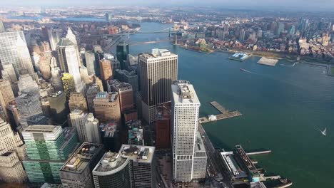 A-high-flying,-4K-drone-shot-over-lower-Manhattan,-New-York-City,-including-the-Freedom-tower-and-the-World-Trade-Center