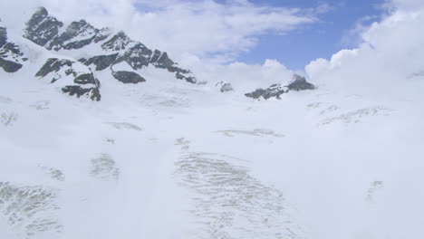 Snowy-Mountain-Landscape-of-the-Aletsch-Glacier-in-Switzerland's-Bernese-Alps,-Aerial
