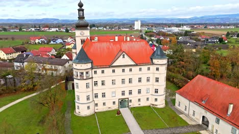 Aerial-View-Of-Hartheim-Castle-In-Upper-Austria---Drone-Shot