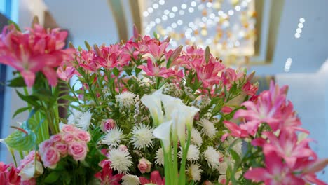 pink-and-white-flowers-decoration-at-the-entrance-of-hotel-push-out-shot