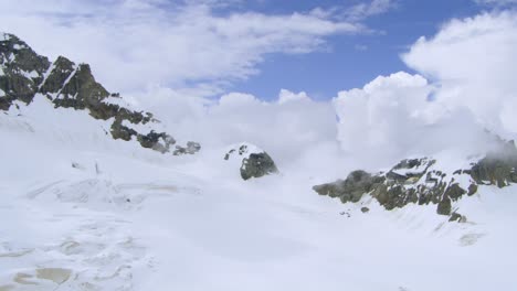 Snowy-Mountain-Peaks-of-Gemmi-Pass-near-Aletsch-Glacier,-Switzerland,-Aerial