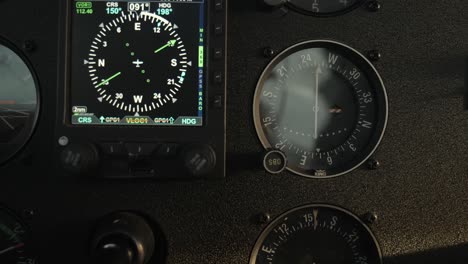 Close-Up-Airplane-Navigation-Instruments---Digital-HSI-during-Turn