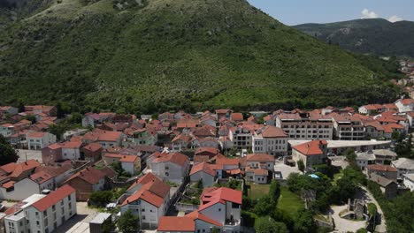 Panoramic-drone-view-of-Mostar-city-from-above,-historical-city-view