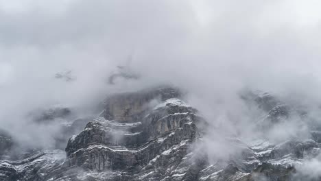 Swiss-Mountain,-in-Winter,-full-of-Clouds