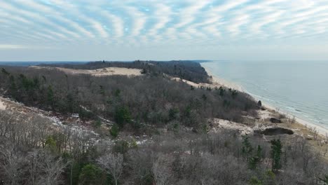 Lush-and-fluffy-clouds-over-Lake-Michigan's-Dune-covered-coast