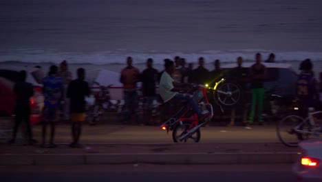 vehicle-acrobatics,-wheelie,-or-wheelstand-in-africa-dangeorus-risky-maneuver-in-slow-motion