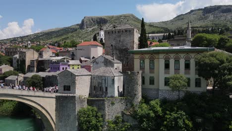 Aerial-drone-view-Ottoman-architecture-of-Mostar-is-a-beautiful-city-in-Europe,-historical-mostar-bridge-view