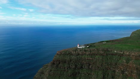 drone-video-of-lighthouse-on-a-side-of-a-cliff
