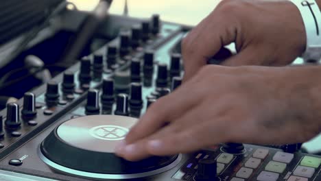 Close-Up-Mixing-Music-Dj-Hands-on-yours-Mixing-Board-at-Day-Light,-Slow-Motion