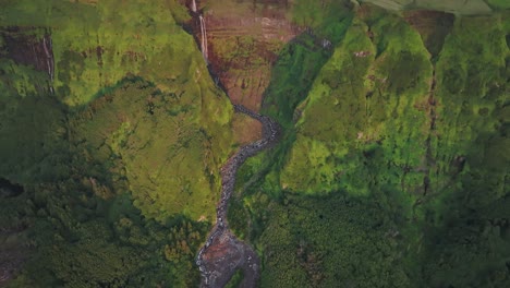 Aerial-view-of-big-waterfall-Cascata-da-Ribeira-Grande-at-flores---Drone-shot