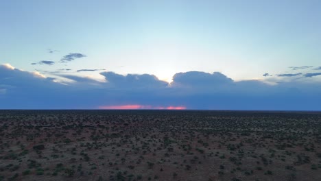 Rising-drone-view,-revealing-the-southern-Kalahari-during-early-summer