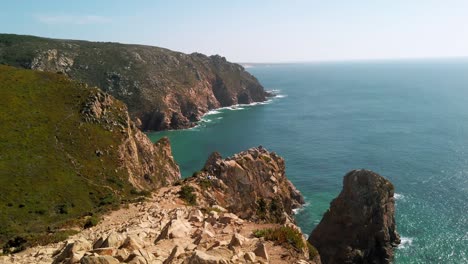 Portugal,-Cabo-da-Roca-lookout-point-with-the-view-of-the-rocky-hillside-and-Atlantic-Ocean