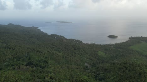 Flying-off-Monte-Rojo-mountain-on-the-Samaná-peninsula-in-the-Dominican-Republic-towards-popular-Cayo-Levantado-island