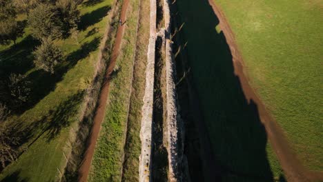 Aerial-View-of-Passage-at-Top-of-Ancient-Roman-Aqueduct-to-Transport-Water