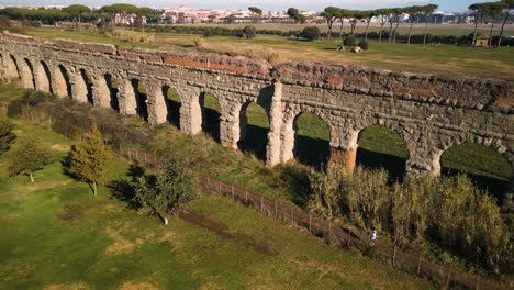 Aerial-Pullback-Reveals-Claudio-Aqueduct,-Ancient-Roman-Architecture