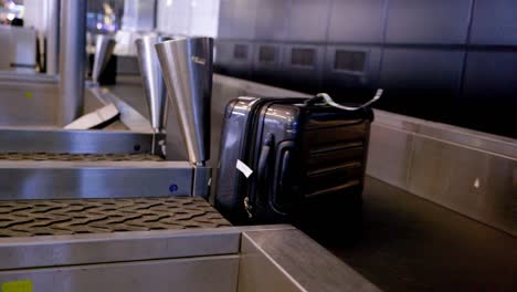 A-suitcase-on-an-airplane-loading-lane