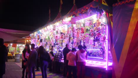 marble-games-is-a-very-common-variety-of-entertainment-at-any-mexican-funfair,-is-particullary-popular-among-children