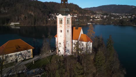 Backward-Drone-Shot-Reveals-Lake-Bled,-Slovenia
