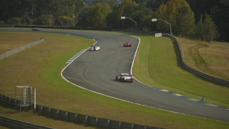 Multiple-Race-Cars-Approaching-a-Corner