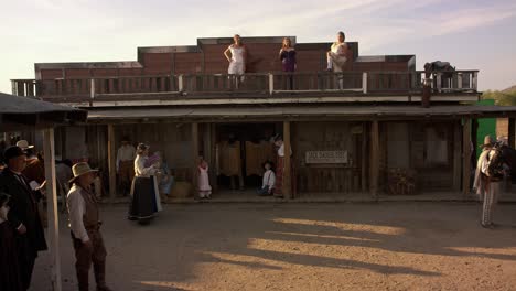 Period-style-reenactment-of-wild-west-scene-in-front-of-saloon