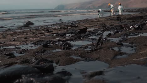 Oil-workers-cleaning-oil-spill-contamination