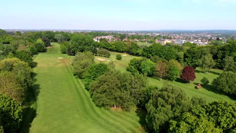 Aerial-Pan-and-Tilt-over-English-Golf-Course-on-a-Beautiful-Sunny-Day