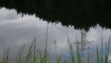 Water-reflection-on-a-lake-in-Austria,-Seefeld-in-summer