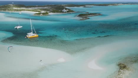 Parasailing---Tourism-Catamarans-on-Breathtaking-Waters-in-Bahamas,-Aerial