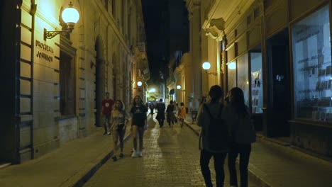 Busy-Cuban-city-street-at-night-in-slow-motion