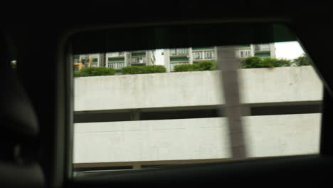 View-from-inside-of-a-car-driving-on-the-road-in-hongkong-city,-China
