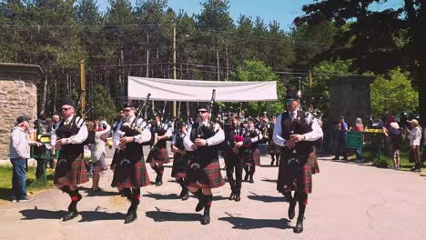 Bagpipers-play-at-Memorial-Day-parade-Portland,-Maine