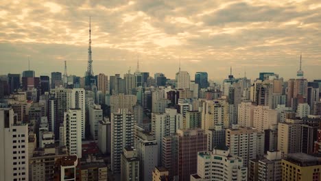 Splendid-opening-aerial-shot-of-São-Paulo-city-in-sunset,-cidade-mirante-avenida