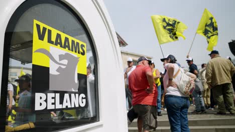 Logo-of-far-right-political-party-Vlaams-Belang-during-manifestation-in-Brussels,-Belgium