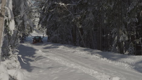 Snow-plow-clears-a-remote-park-road-on-a-sunny-winter-day