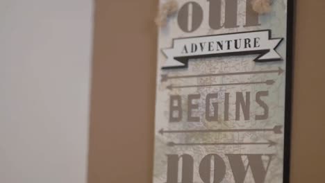 Our-Adventure-Begins-Now-Quote-Hanging-On-Wall