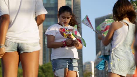 Children-playing-with-kites-at-Praca-Maua,-in-Rio-de-Janeiro,-Brazil