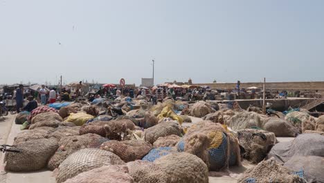 Huge-pile-of-fishing-nets-behind-the-market-in-Essaouira,-Morocco