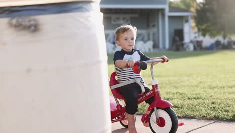 Dad-Pushing-Son-On-Radio-Flyer-Tricycle-Summer-Evening