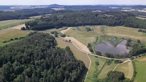 Drone-shot-overview-of-a-the-beautiful-landscape-of-Boos-in-the-Eifel,-Germany