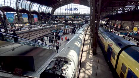 18-April-2023---Inside-View-Of-Hamburg-Hauptbahnhof-Looking-Down-At-ICE-Train-Arriving-At-Platform
