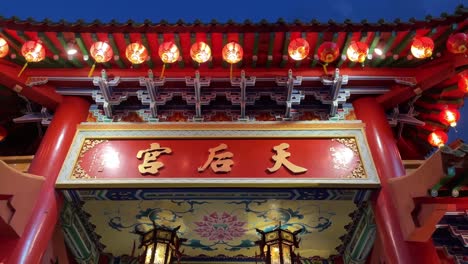 Tilt-up-view-of-the-signage-board-written-in-Chinese-'Thean-Hou-Temple',-in-Kuala-Lumpur,-Malaysia