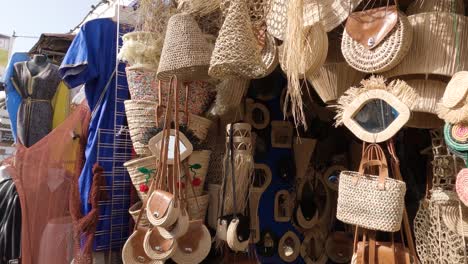 Street-vendor-in-medina-with-wide-selection-of-handmade-souvenirs