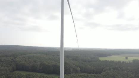A-tilt-drone-shot-of-a-wind-turbine