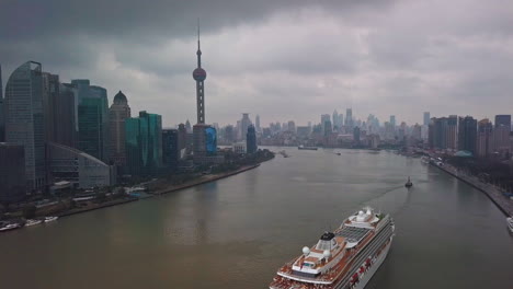 Viking-Sun-Cruise-Ship-Sailing-on-Huangpu-River-in-Shanghai,-China