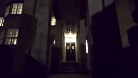 Entrance-of-the-Stoclet-Palace-at-night-in-Brussels,-Belgium