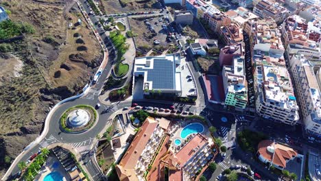Hotel-resort-town-in-Tenerife-Canary-Islands-aerial-by-drone,-Spain